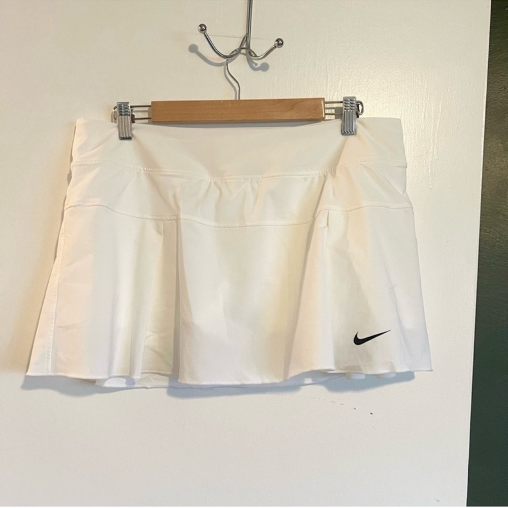 Nike ivory white short tennis skirt with built in shorts 
size large